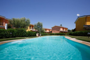 Villa Mama con piscina condominiale, giardino e barbecue Sant'anna Arresi